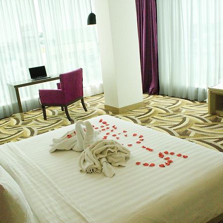 S-One Hotel Palembang Palimbão Exterior foto