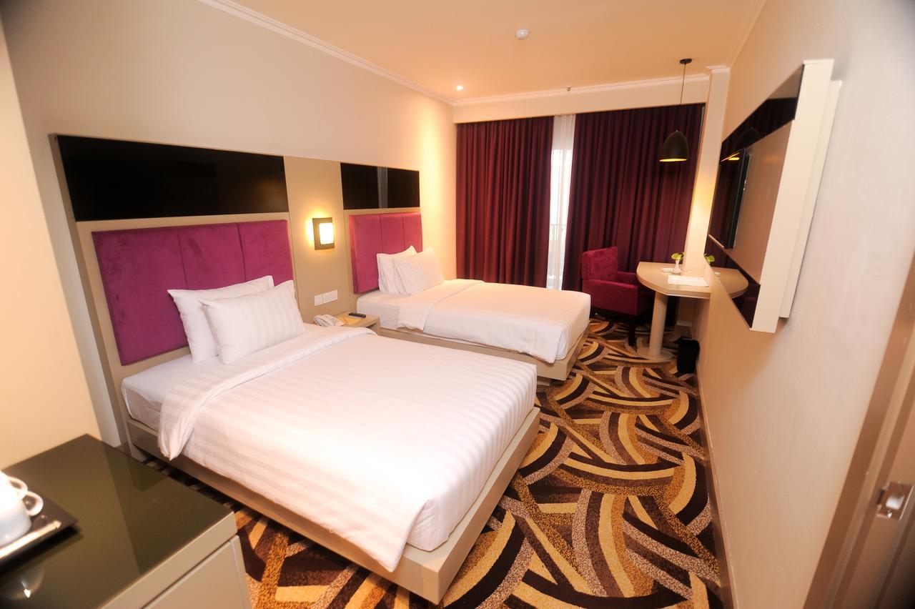 S-One Hotel Palembang Palimbão Exterior foto
