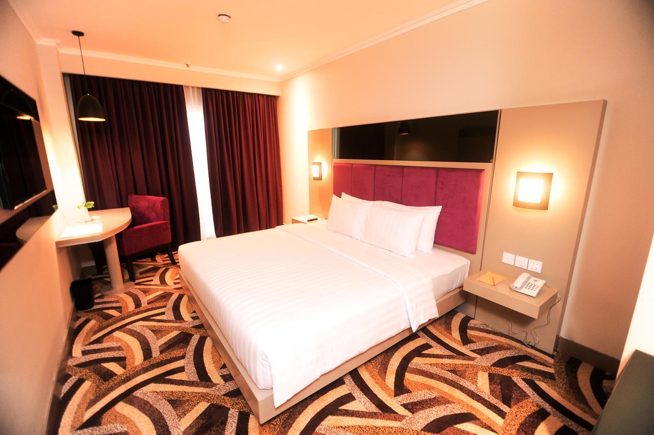 S-One Hotel Palembang Palimbão Exterior foto